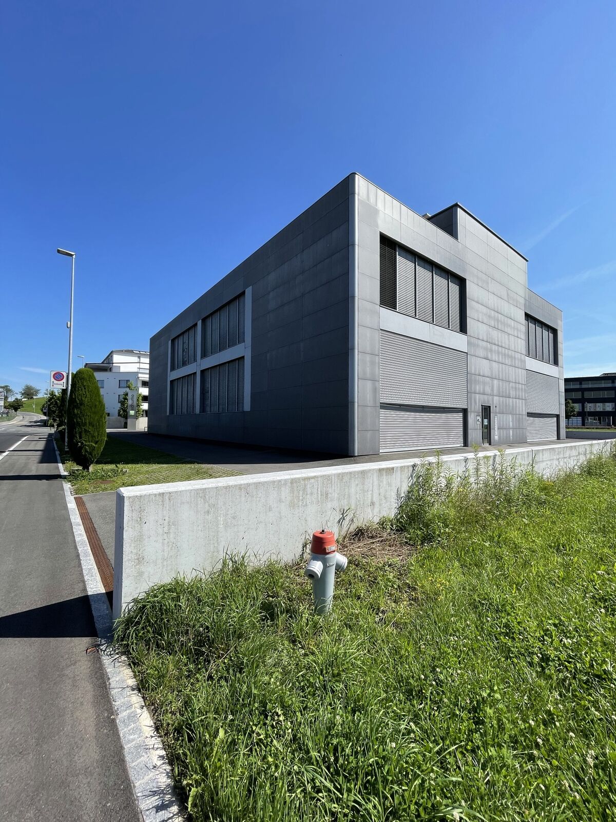 Fabbrica Schumo: edificio industriale, amministrativo e appartamenti · Steinhausen, Zugo